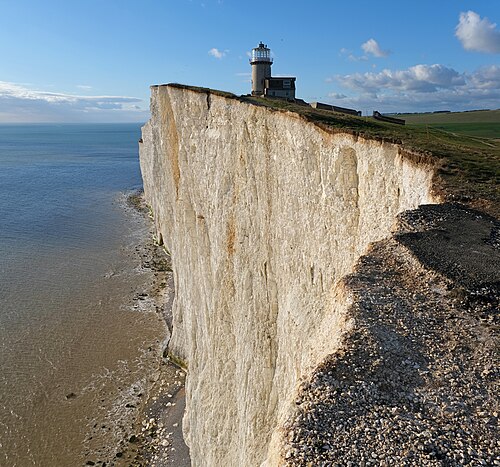 Belle Tout lighthouse and chalk cliffs by the English Channel